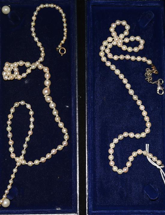 Two cultured pearl necklaces, one even strung and one graduated.